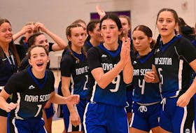 The Nova Scotia under-15 women’s basketball team celebrate their semifinal win Friday over host Quebec at Canada Basketball 15U and 17U national championships in Sherbrooke, Que. The provincial team earned silver at nationals. - CANADA BASKETBALL