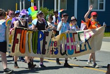 A group of people walks in the Pride Cape Breton parade on Saturday at noon in Sydney. It marked the return of the parade after the last two weren't held due to the COVID-19 pandemic. NICOLE SULLIVAN/CAPE BRETON POST