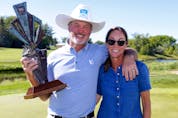 Jerry Kelly celebrates his Shaw Charity Classic victory with his wife Carol at Canyon Meadows Golf and Country Club in Calgary on Sunday, Aug. 7, 2022. 