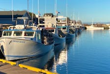 Lobster boats are loaded with traps in North Rustico Harbour prior to the beginning of the 2022 lobster season. The season, which wrapped up June 30, is being described by Prince Edward Island fishers as one with many unexpected ups and downs. File