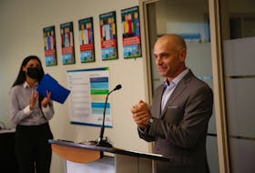 Dr Tim Holland, medical lead at the Newcomer Medical Clinic, gives his thanks at a new funding announcement at the clinic in Halifax TUESDAY August 9, 2022. At left is Jill Balser, 
Minister of Labour, Skills and Immigration.