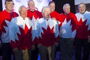 Former 1972 team Canada members gather at the end of a press conference in Montreal Tuesday, February 9, 2016 to announce the '72 Summit Series Tour. From the left are: Serge Savard, Yvan Cournoyer, Ken Dryden, Pat Stapleton, Pete Mahovlich, Phil Esposito and Guy Lapointe. 