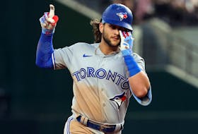 Bo Bichette of the Toronto Blue Jays gestures as he runs the bases after a two-run home run against the Texas Rangers in the third inning at Globe Life Field on September 09, 2022 in Arlington, Texas. (Photo by Richard Rodriguez/Getty Images)