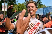 Benoit Cosnefroy of France reacts after winning the Grand Prix cycliste de Québec, in Quebec City, Friday, Sept. 9, 2022.