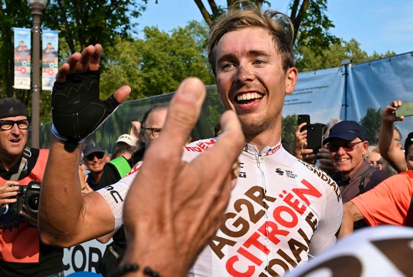 Benoit Cosnefroy of France reacts after winning the Grand Prix cycliste de Québec, in Quebec City, Friday, Sept. 9, 2022.