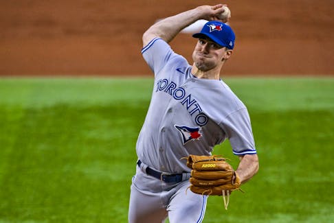 Blue Jays starting pitcher Ross Stripling  pitches against the Texas Rangers during the first inning at the Globe Life Field.
