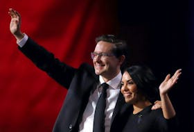 Pierre Poilievre and his wife Anaida celebrate after he is elected as the new leader of Canada's Conservative Party in Ottawa, Ontario, Canada, September 10, 2022. REUTERS/Patrick Doyle