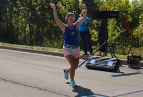 Michelle Crane-Murphy of Sydney completes a full marathon, a 42.2-kilometre run, on Sunday. "Because of what this day means to us, I feel happy and grateful we were able to do this." IAN NATHANSON/CAPE BRETON POST