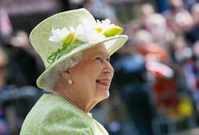 FILE PHOTO: Britain's Queen Elizabeth smiles as she greets well wishers on her 90th birthday during a walkabout in Windsor, west of London, Britain April 21, 2016.     REUTERS/Stefan Wermuth/File Photo  Queen Elizabeth smiles as she greets well wishers on her 90th birthday during a walkabout in Windsor, west of London on April 21, 2016.     REUTERS/Stefan Wermuth/File Photo
