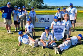 The New Waterford Dodgers under-12 team captured a provincial baseball championship in New Waterford over the weekend. In back, from the left, are coach Murdock Sampson, team-helper Emily Munroe, Pfeiffer Langley, Ainsley O’Handley, Avery Clyburn, Gracie Hearn, Elizabeth Carrigan and coach Shaun Langley. In the middle row, from the left, are Ella Grant, Gia Merrill and Lilly Parris. In front, from the left, are Josie MacKinnon, Sophie Corbett and Hannah MacNeil. CONTRIBUTED