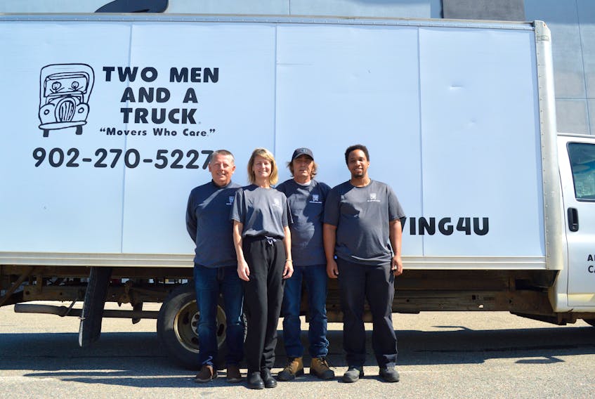 From left, Dave Young, Cora MacNeil, David Yates and Marshall Clayton are part of the team at Two Men and a Truck, a moving franchise Schwartz Furniture owner recently opened in Sydney. Chris Connors/Cape Breton Post