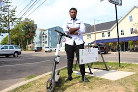 Tafadzwa Mpaso is owner of Epic Electric Scooters. Rafe Wright • The Guardian