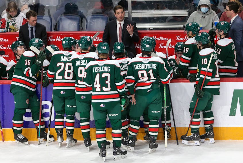 Halifax Mooseheads head coach, Sylvain Favreau, looks up at the score clock, during a 30 second timeout following the Acadie-Bathurst Titan's 4th goal of the 1st period during QMJHL playoff action in Halifax Monday May 9, 2022. The Titan went on to win, 8-1.

TIM KROCHAK PHOTO