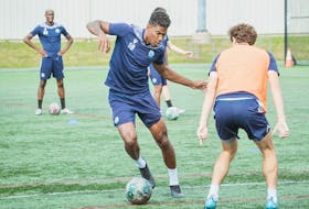HFX Wanderers captain Andre Rampersad (left) goes through a drill during a team training session Tuesday in Halifax. The Wanderers will visit York United on Friday night. - HFX WANDERERS FC