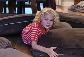 Grandson Miles doesn't need toys when he can take the cushions off the couch. Contributed photo