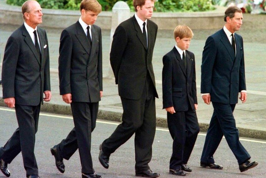  In this file photo taken on Sept. 6, 1997 (L to R) Britian’s Prince Philip, Duke of Edinburgh, Prince William, Earl Spencer, Prince Harry and Prince Charles, Prince of Wales, walk outside Westminster Abbey during the funeral service for Diana, Princess of Wales.