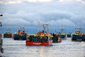 Lobster fishing boats loaded with fishing gear  leave the Falls Point, Nova Scotia, at the first day of the LFA 34 fishery on Dec. 1, 2021. FILE PHOTO/KATHY JOHNSON