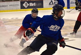Cape Breton Jets players Rory Mills, right, and William Brown make complete stops at the redline during a skating drill at team practice at the Membertou Sport and Wellness Centre on Tuesday. Mills and Brown will be among the rookie players making their Nova Scotia Under-16 ‘AAA’ Hockey League debuts this weekend in Membertou. JEREMY FRASER/CAPE BRETON POST.