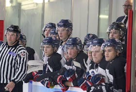 Valley Wildcats players watch the action Sept. 10 during pre-season action with the South Shore Lumberjacks at the Kings Mutual Century Centre in Berwick.
Jason Malloy