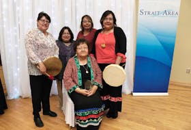 Ma'git Poulette in 2017 at the Port Hawkesbury Civic Centre after winning the Kevin Beaton Heart of the Community award. With her are, from left, daughter Rosie Sylliboy, niece Na