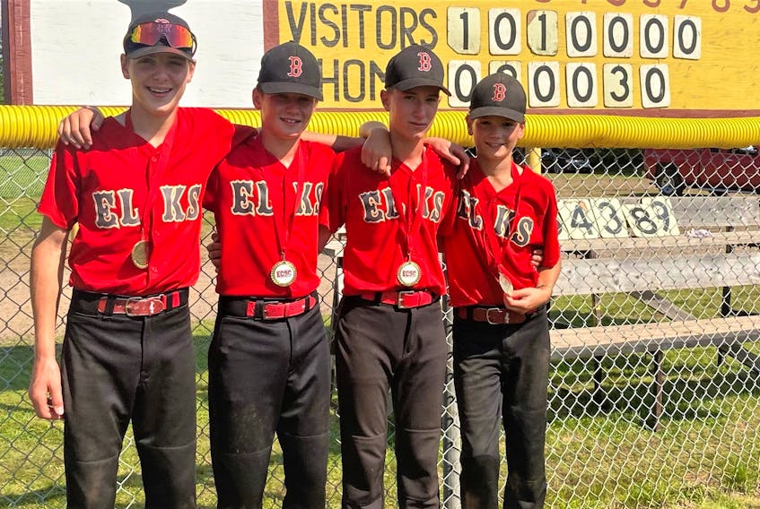 Brookfield Elks players Tyler Sullivan (left), Ewan White, Cooper Singer and Rigby VanTassell display their gold medals following U-15 Eastern Canadians. Contributed