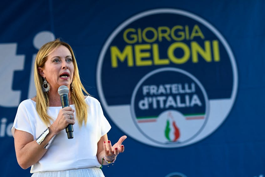 FILE PHOTO: Giorgia Meloni, leader of the far-right Brothers of Italy party, speaks during a rally in Duomo square ahead of the Sept. 25 snap election, in Milan, Italy, September 11, 2022. REUTERS/Flavio Lo Scalzo  Giorgia Meloni, leader of the far-right Brothers of Italy party, speaks during a rally in Duomo Square ahead of the Sept. 25 snap election, in Milan, Italy, on Sept. 11. Meloni is expected to win the election. REUTERS file photo/Flavio Lo Scalzo