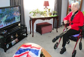 Amelia Collis, 92, or North Sydney awoke at 5:30 a,m. Monday to view the coverage of Queen Elizabeth II's state funeral held in London — complete with a Union Jack laid on her coffee table. Collis also saw the queen in person during a church service at Centre 200 in 1994. IAN NATHANSON/CAPE BRETON POST