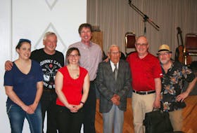 Lester MacPherson, second left, Jim Williams, right, and members of Fiddlers' Sons stand with late Kaylee Hall owner Charlie Fraser, third from the right. The musicians will perform during a finale show at the Kaylee Hall with a special night of music on Thursday, Sept. 22 at 8 p.m. Contributed