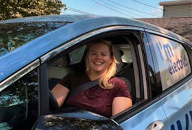 Sarah Balloch, Clean Transportation Manager, in Zevvy the Chevy Bolt. PHOTO CREDIT: Contributed/Next Ride
