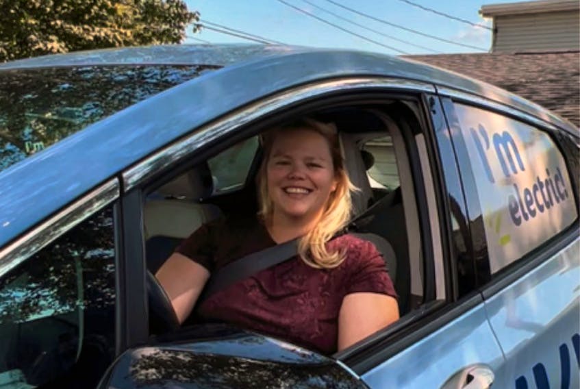 Sarah Balloch, Clean Transportation Manager, in Zevvy the Chevy Bolt. PHOTO CREDIT: Contributed/Next Ride
