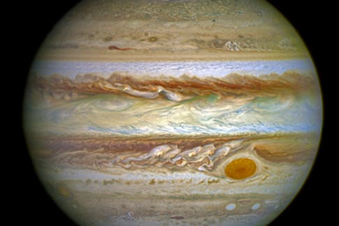 Majestic Jupiter, with vivid auroras at its poles in this image captured by the Hubble Space Telescope in 2016, will be the closest it’s been to Earth in seven decades on Sept. 26 and won’t get this near again for another 107 years. Photo courtesy of NASA Image and Video Library