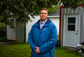 John Stevens, the church shelter project manager with the Archdiocese of Halifax-Yarmouth, poses for a photo in front of two shelters on the grounds of the Saint Theresa Catholic Church on Tuesday, Sept. 20, 2022.
Ryan Taplin - The Chronicle Herald