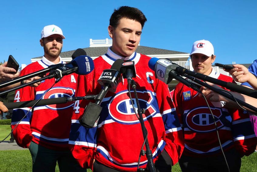 Nick Suzuki addresses reporters after being named the new captain of the Montreal Canadiens at the team's annual golf tournament in Laval, north of Montreal Monday September 12, 2022.