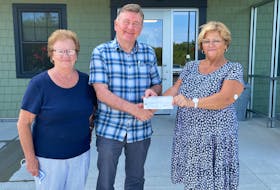 Members of the Langlois family donated $3,500 to Hospice Cape Breton following their family reunion this summer. From the left are Stella Munroe (reunion committee member) Corrie Stewart, executive director of hospice, and Linda Kitchen-Clark, (reunion committee member. CONTRIBUTED
