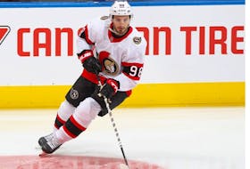 Victor Mete of the Ottawa Senators warms up prior to playing against the Toronto Maple Leafs in an NHL game at Scotiabank Arena on October 16, 2021 in Toronto, Ontario, Canada.