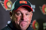 Ottawa Senators head coach DJ Smith answers questions from the media following an on ice session during training camp at the Canadian Tire Centre on Sept. 22, 2022.
