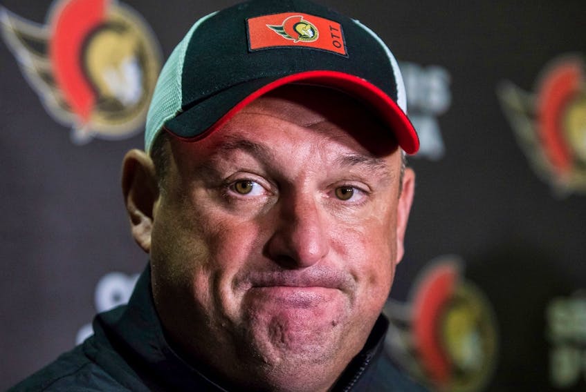 Ottawa Senators head coach DJ Smith answers questions from the media following an on ice session during training camp at the Canadian Tire Centre on Sept. 22, 2022.