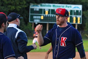 Kentville Wildcats congratulate pitcher Cory Boutilier, right, for getting an out to end an inning during Game 2 of the team's Nova Scotia Senior Baseball League semifinal with the Dartmouth Moosehead Dry at Kentville Memorial Park. He recorded two complete game victories in the best-of-five series.