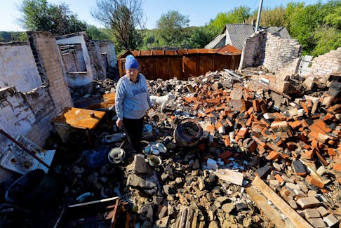 Local resident Valentina Kryzhnaya, 73, stands amidst the debris of her house destroyed in the course of the Russia-Ukraine war near Lysychansk, the city controlled by pro-Russian troops in the Luhansk region, Ukraine, on Wednesday. Columnist Dariia Pasko says actions must meet the words of Ukraine's western allies. REUTERS/Alexander Ermochenko