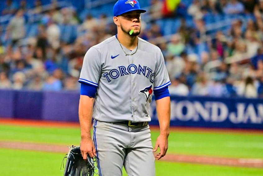 Blue Jays starting pitcher Jose Berrios walks off the field following the second inning against the Rays at Tropicana Field in St Petersburg, Fla., Thursday, Sept. 22, 2022.
