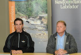 Justice and Public Safety Minister John Hogan (left) and Transportation and Infrastructure Minister Elvis Loveless speak at a news conference about the damage done by hurricane Fiona, in the Provincial Emergency Operations Centre in St. John’s on Sunday afternoon, Sept. 25. Joe Gibbons • The Telegram