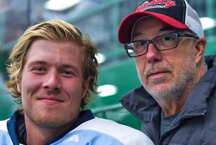Vancouver Canucks winger Brock Boeser with his father Duke. 