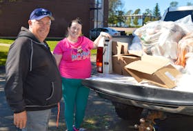 Alan Hicken, left, manager of the emergency shelter at Jack Blanchard Family Centre on Pond Street in Charlottetown, and Alta Bernard, who works with the Community Outreach Centre in Charlottetown, were among the volunteers cleaning up after sheltering about 40 people from post-tropical storm Fiona on Sept. 24. Dave Stewart • The Guardian