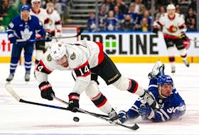 Ottawa Senators forward Tyler Motte (14) breaks away from Toronto Maple Leafs forward Auston Matthews (34) before scoring during the third period at Scotiabank Arena.