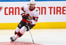 Victor Mete of the Ottawa Senators warms up prior to playing against the Toronto Maple Leafs in an NHL game at Scotiabank Arena on October 16, 2021 in Toronto, Ontario, Canada.  