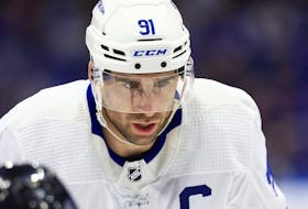 John Tavares of the Toronto Maple Leafs looks on in the first period during a game against the Tampa Bay Lightning at Amalie Arena on April 21, 2022 in Tampa, Florida.