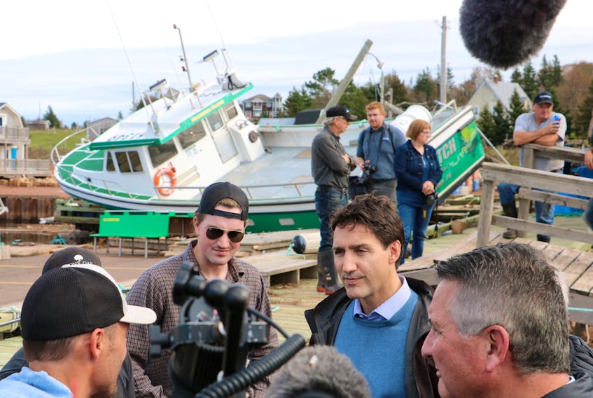 Prime Minister Justin Trudeau surveyed damage at the Stanley Bridge marina during a P.E.I. visit on September 27. The wharf sustained significant damage during post-tropical storm Fiona.