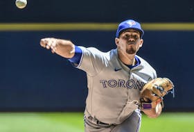 Toronto Blue Jays pitcher Jose Berrios throws a pitch in the first inning against the Milwaukee Brewers at American Family Field. 