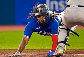 Blue Jays first baseman Vladimir Guerrero Jr. slides into home plate against the New York Yankees at Rogers Centre. 