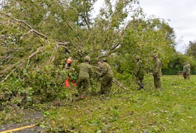 A total of 34 Canadian soldiers from the P.E.I. Regiment, 36 Signal Regiment and 33 Field Ambulance were at Birchwood Intermediate School on Longworth Avenue in Charlottetown on Sept. 27 to help with cleanup efforts from post-tropical storm Fiona. TERRENCE MCEACHERN • THE GUARDIAN